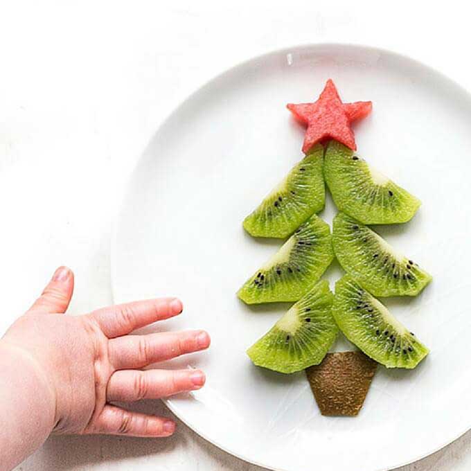 Albero di Natale di kiwi - Uno spuntino festivo divertente e salutare per i bambini.